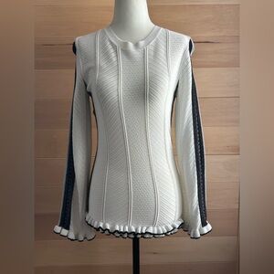 Amaryllis, Size Medium long sleeves bell sleeves black and white knit ruffled
